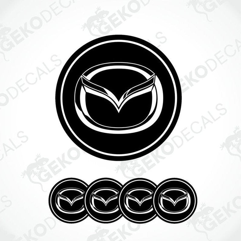 A set of four black vinyl stickers with a geometric design featuring the Mazda logo.