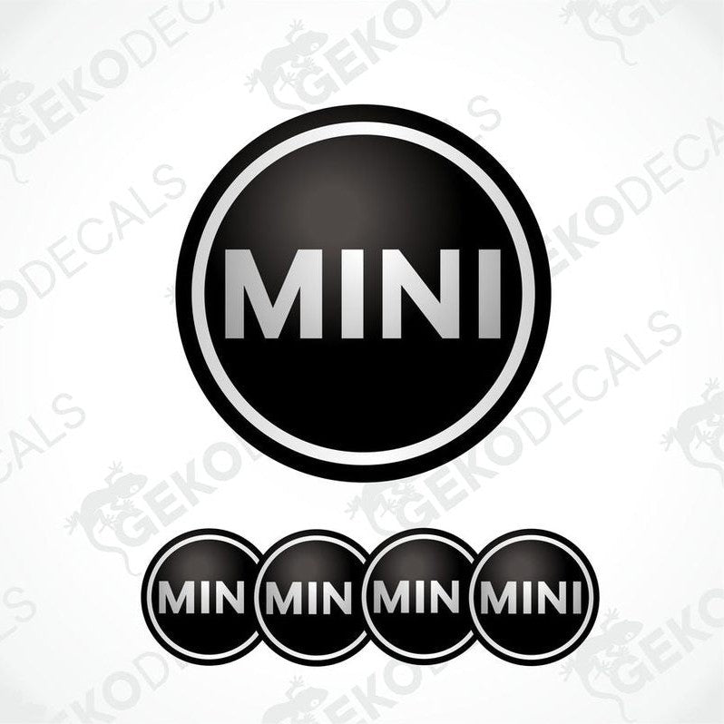 Set of four black vinyl decals with the Mini Cooper logo, designed for use on a vehicle's wheels.