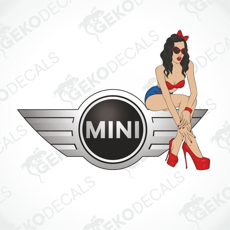 A car decal featuring an illustration of a stylized woman in a bikini sitting beside the Mini Cooper logo.