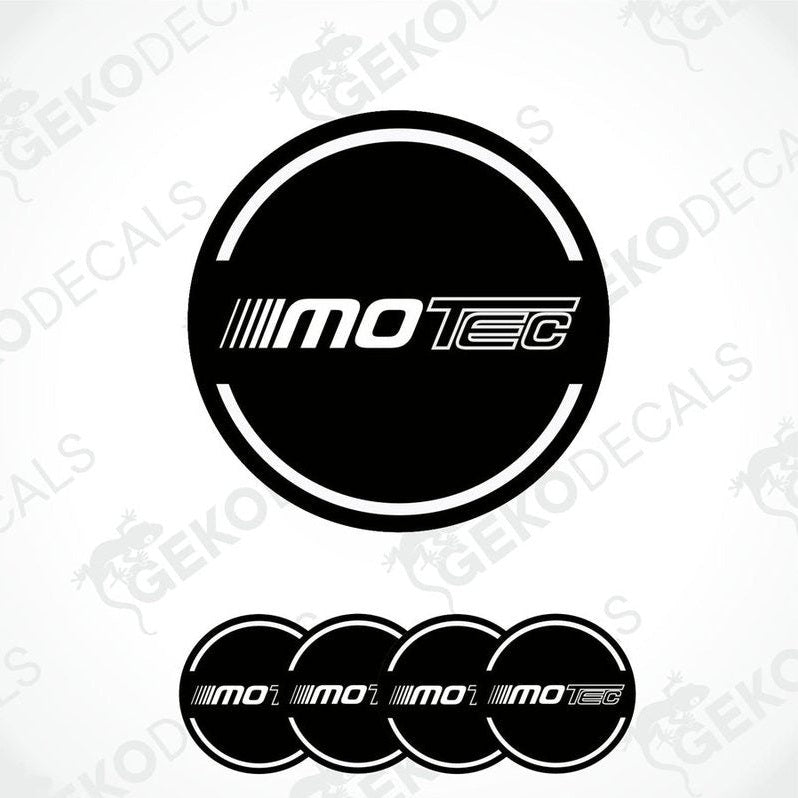 A set of four round vehicle decals with the text 'MOTEC' displayed in a central logo on a black background with white text.
