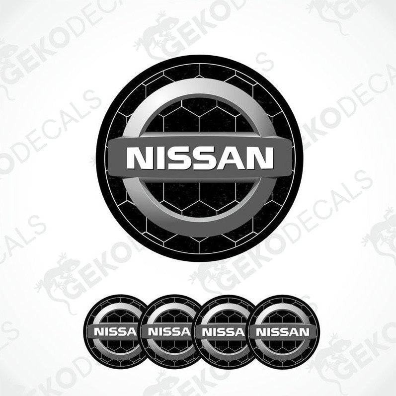 A set of four black vinyl stickers with the NISSAN brand logo on them.