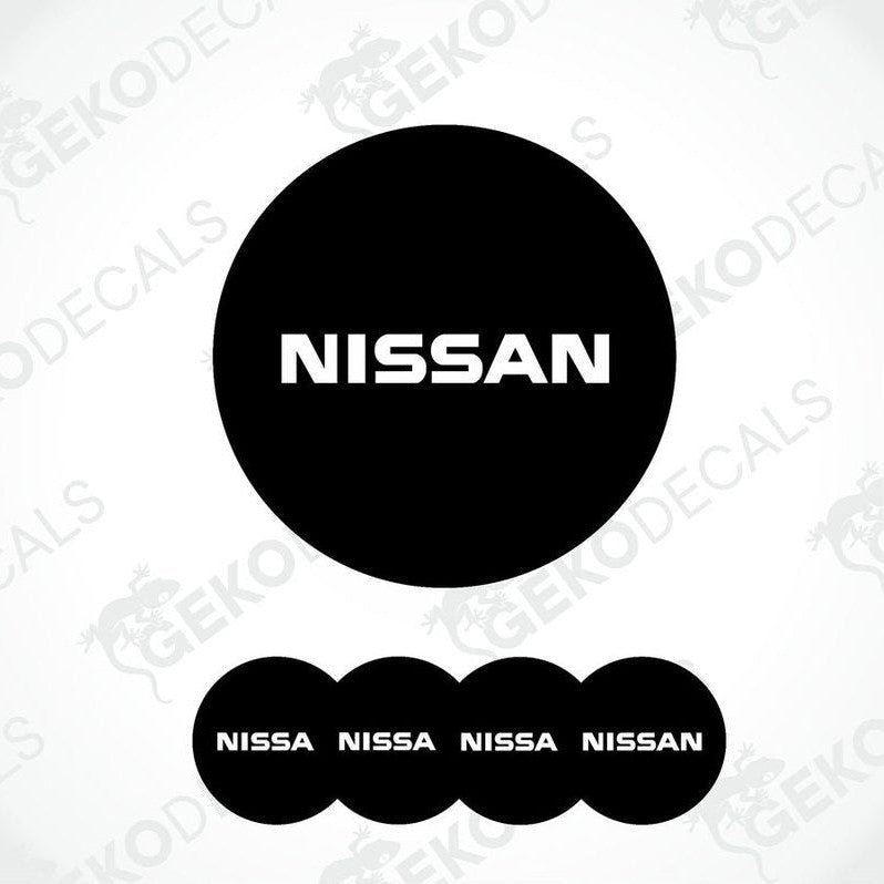 Set of five black vinyl decals with the NISSAN logo, four are round and one is rectangular.