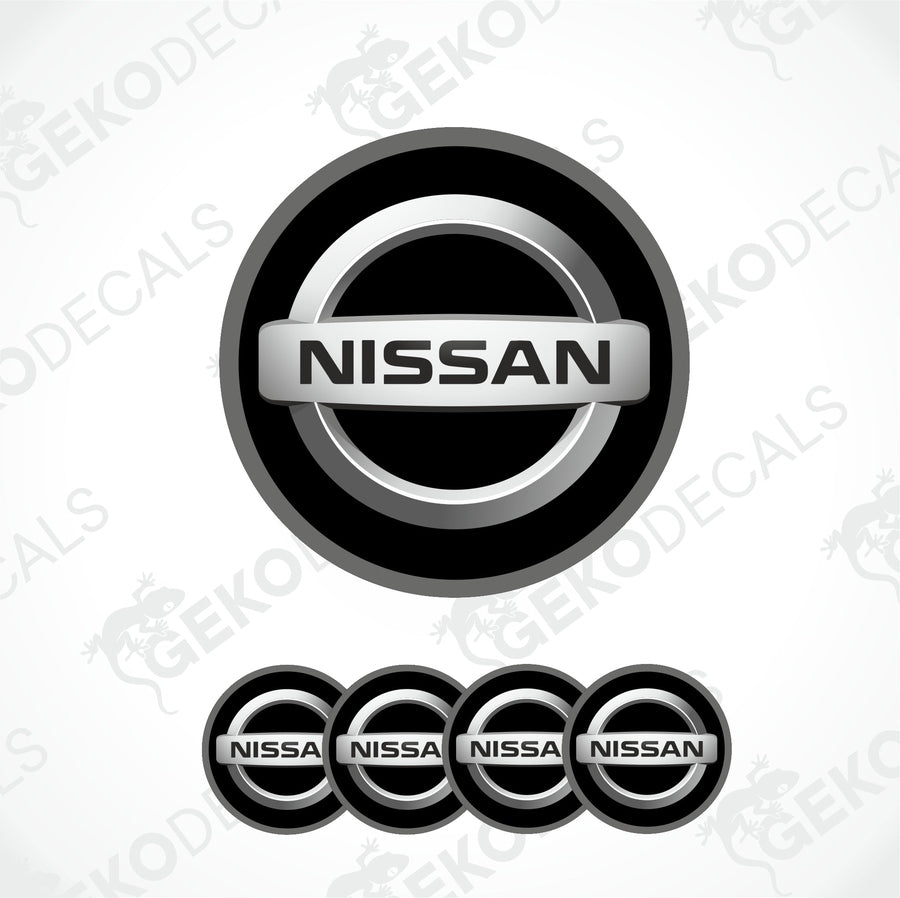 A set of four black vinyl stickers with the NISSAN brand logo on them.