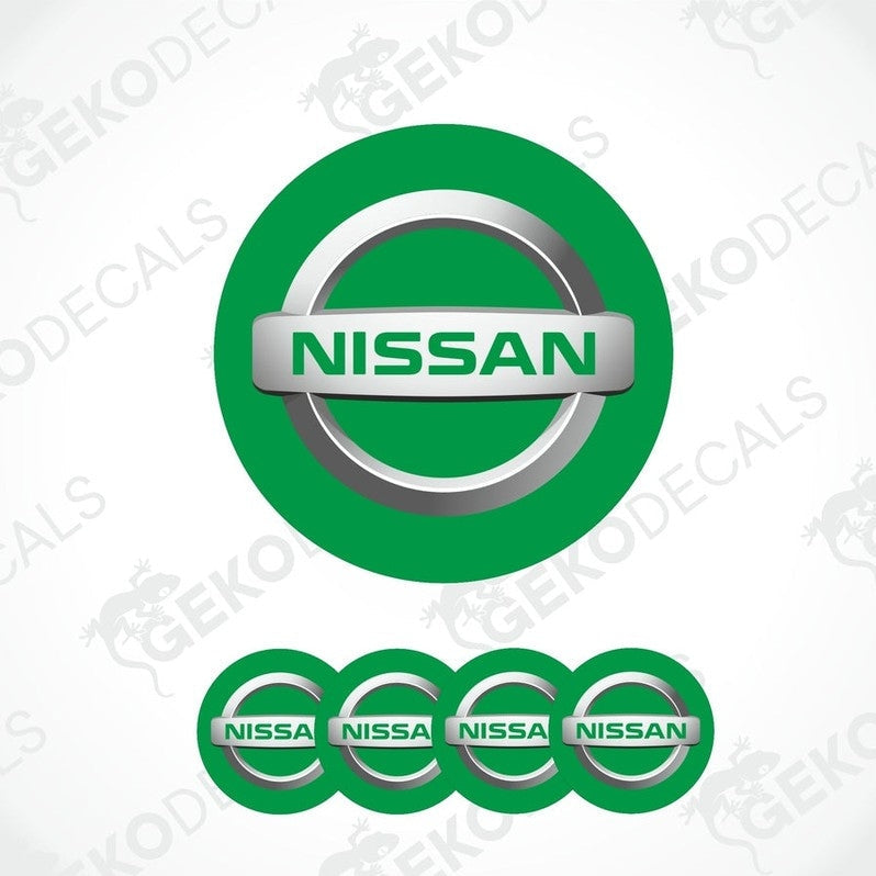 A set of four green vinyl stickers with the NISSAN brand logo on them.