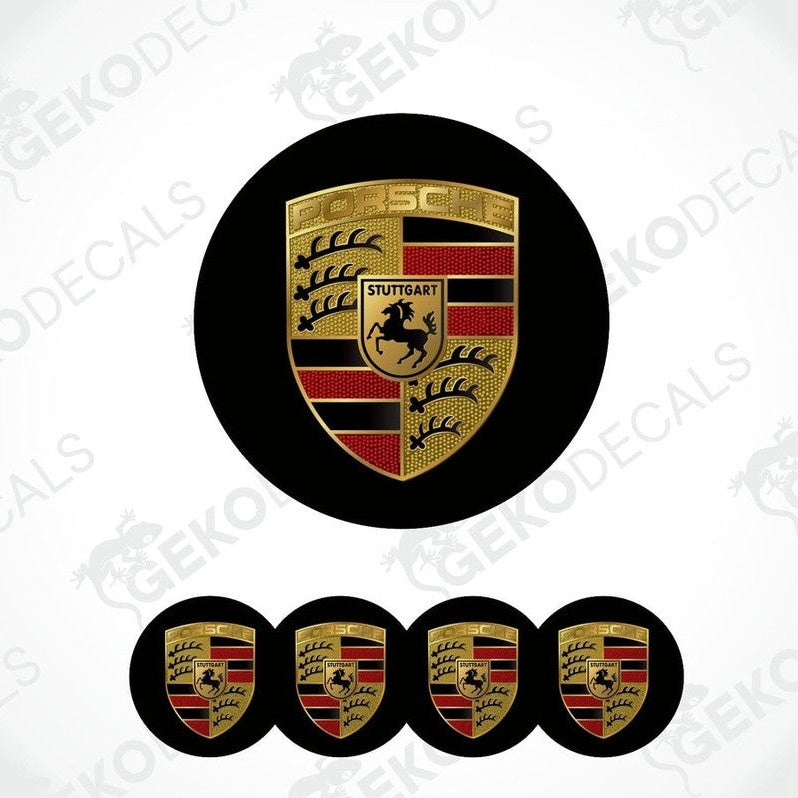 A set of four black, gold, red, and white vinyl stickers with a geometric pattern, featuring the Porsche brand logo.