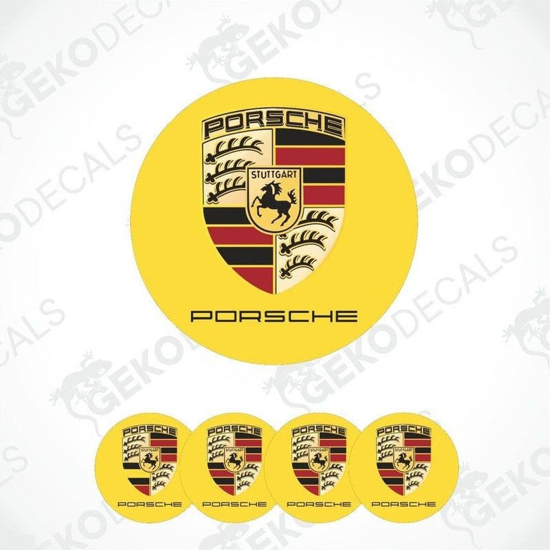 A set of four yellow vinyl decals with the PORSCHE logo and a shield design in the center, displayed against a white background.