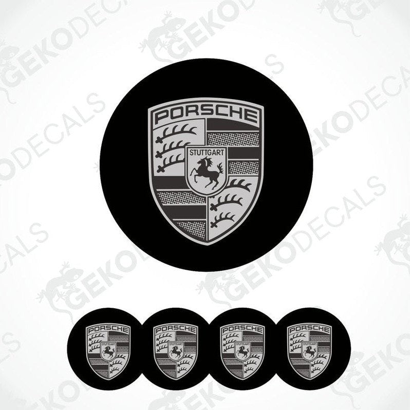 A set of four black and grey Porsche car wheel decals.