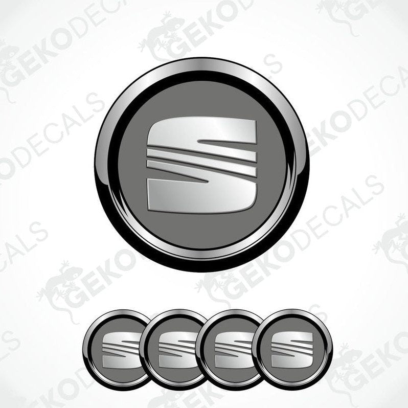A set of round vinyl decals with a polyurethane coating featuring the SEAT logo in the center, surrounded by four additional decals with a slimmer design.