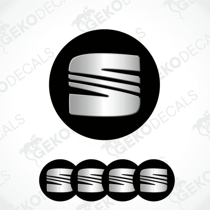 Set of four round car decals with the SEAT logo in black and silver colors.