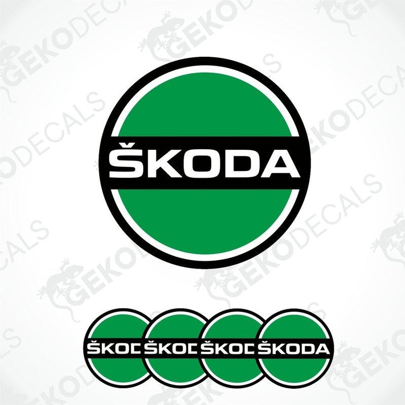 A set of green, black, and white Škoda branded vinyl decals designed for use on car wheels.