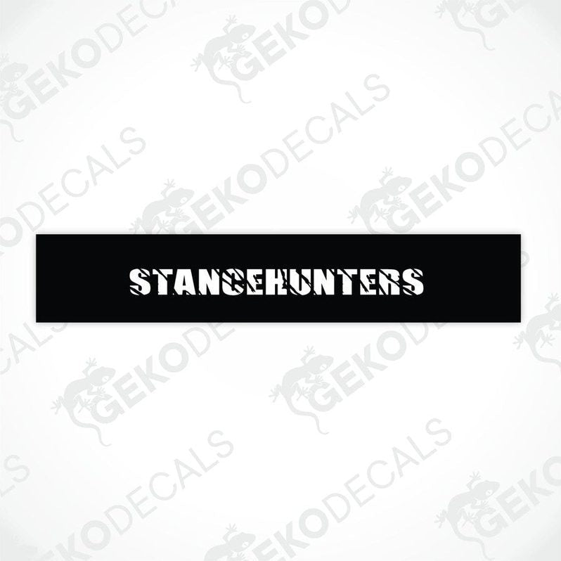 Black car windshield sun visor with white text STANCEHUNTERS