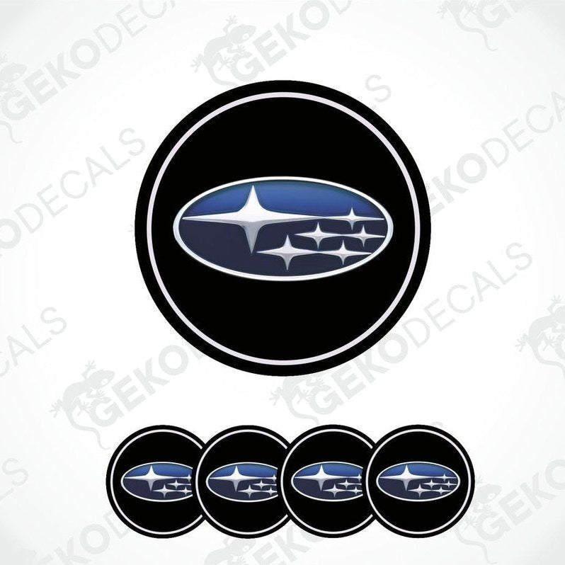 A set of four black vinyl stickers with a blue and white Subaru logo.