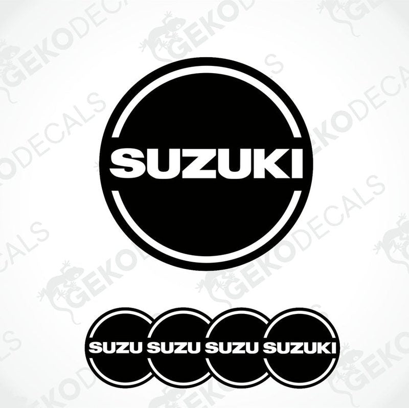 A set of four black and white vinyl stickers with the word 'SUZUKI' in bold letters, designed for use on car decals or wheel caps.