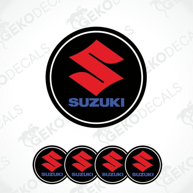 A set of four black vinyl stickers with the SUZUKI brand logo in red and blue.
