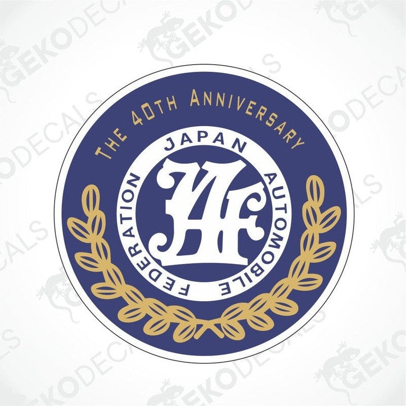 A round blue decal with a gold and white automotive-themed design celebrating the 40th Anniversary of the Japan Automotive Federation.