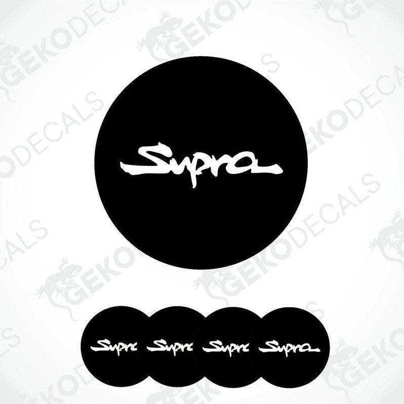 A set of four black vinyl stickers with the word 'TOYOTA SUPRA' written on them, designed for use as car decals.