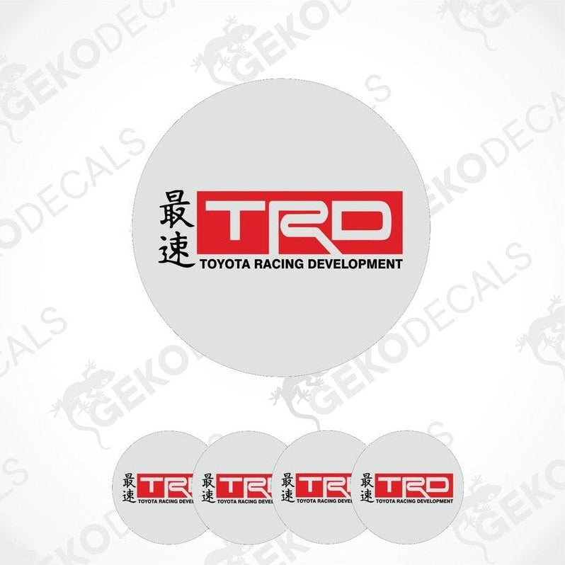 A set of four white vinyl stickers with the Toyota Racing Development logo in red and black.