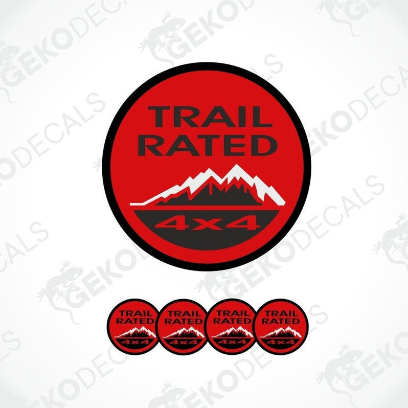 A set of four red vinyl stickers with the text 'TRAIL RATED 4X4' and a mountain range design.