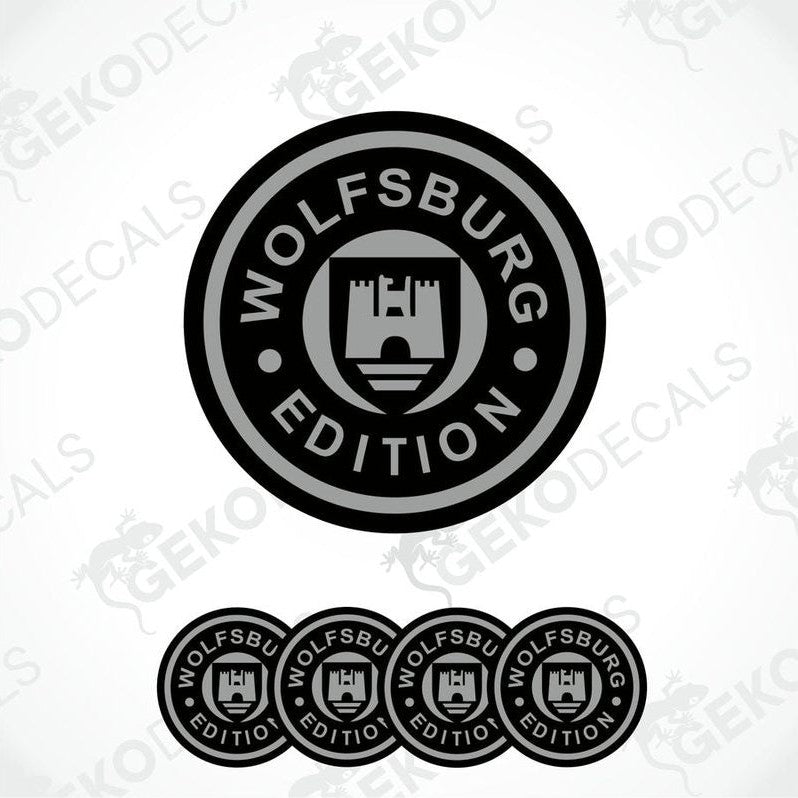 A set of four round vehicle decals with the VOLFSBURG EDITION logo in black and silver colors.