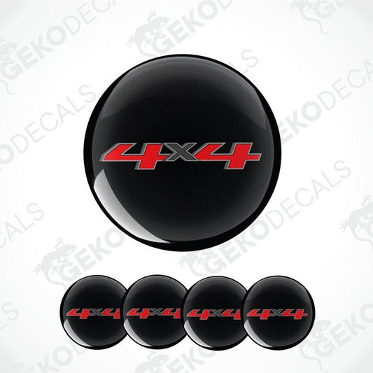 Black wheel cover with red '4x4' logo on a white background