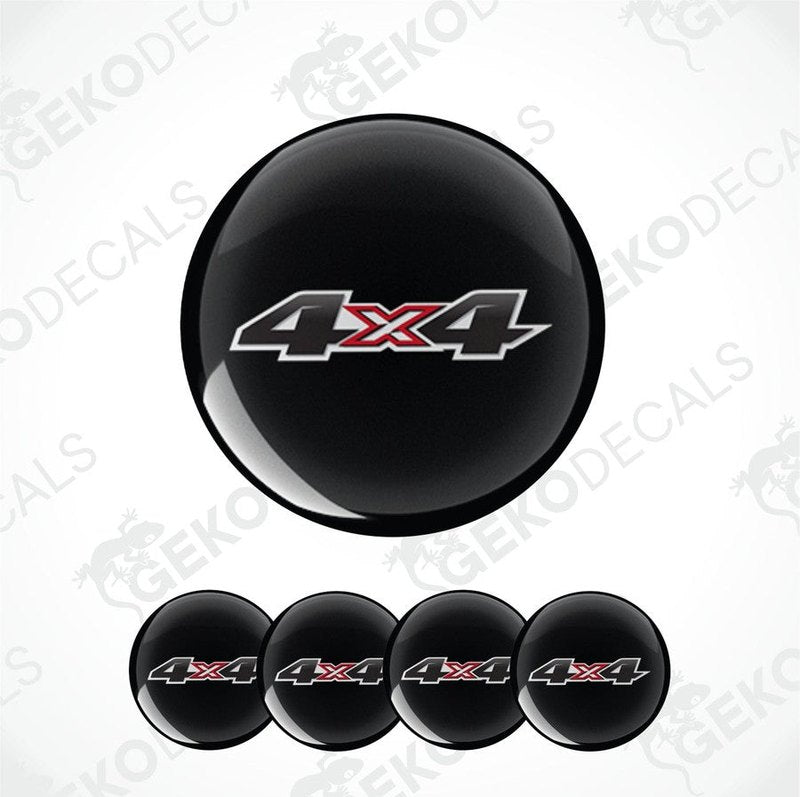 Black wheel cover with '4x4' logo on a white background