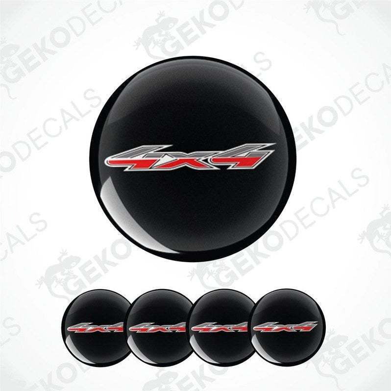 Black wheel cover with '4X4' logo on a white background