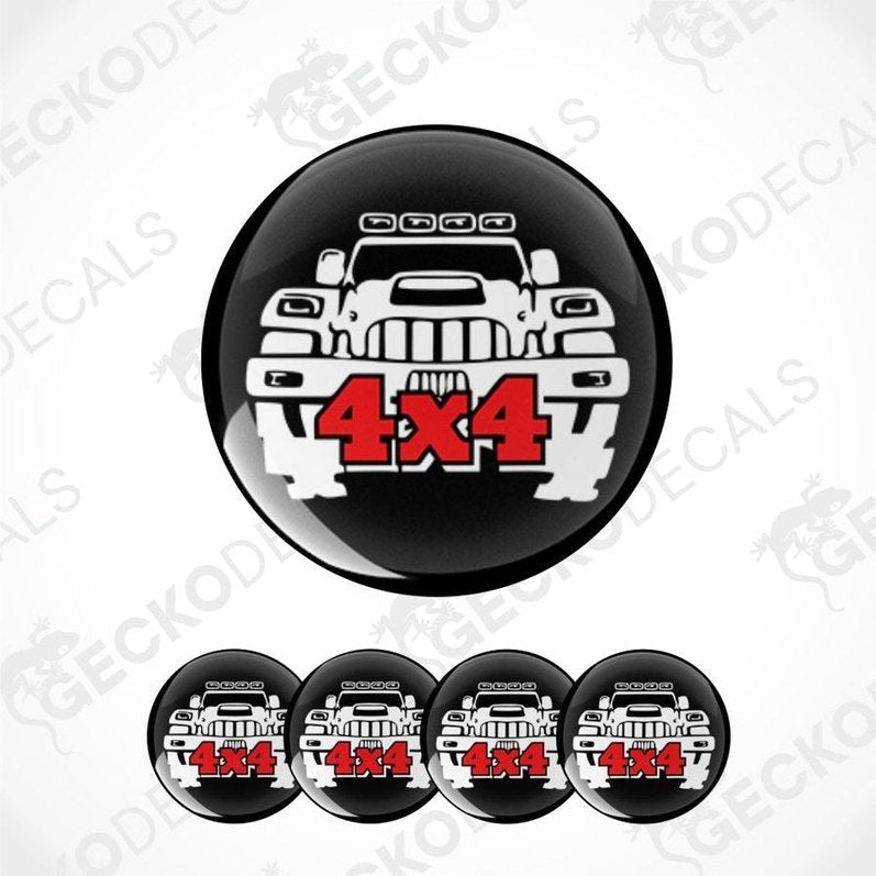 Set of five black stickers with a white truck graphic and red '4x4' text on a white background.