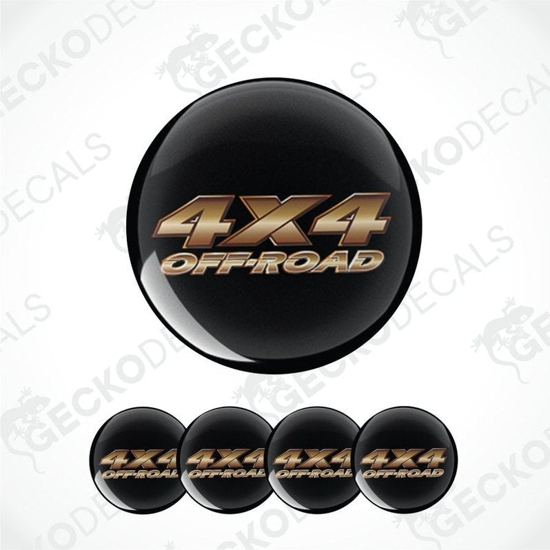Set of 5 black and gold '4X4 Off-Road' wheel center caps on a white background with 'Gecko Decals' watermark.