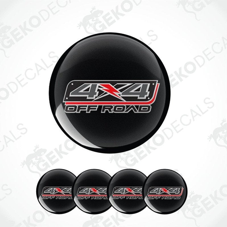 Set of black 4x4 off-road wheel hub covers with '4x4 Off Road' logo on a white background.