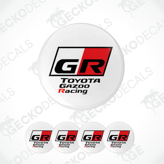 A set of circular white decals featuring the Toyota Gazoo Racing GR logo, with one large decal shown above four smaller identical decals on a light gray background with faint watermark text.