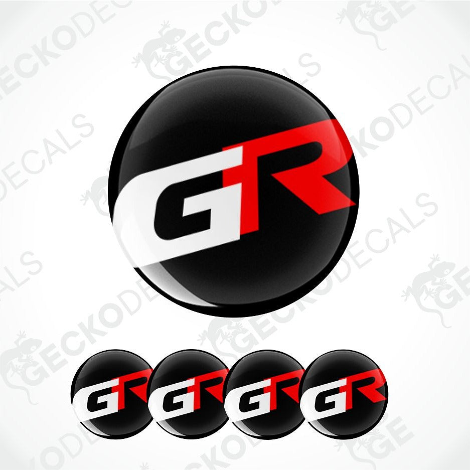 A glossy black oval decal or badge featuring a stylized white and red 'GR' logo, shown on a light gray background with four smaller identical decals aligned along the bottom. Faint repeated 'GECKODECALS' watermarks are visible across the image.