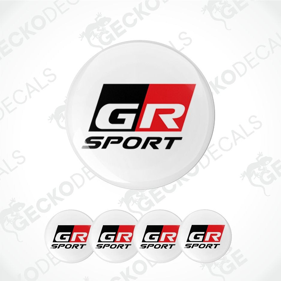 A set of circular car decals featuring the GR Sport logo, with one large decal shown above four smaller identical decals on a light gray background with faint watermarks.