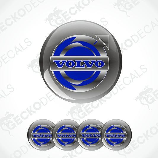 A set of circular glossy decals featuring the Volvo logo, with one large decal at the top and four smaller identical decals aligned horizontally at the bottom, all on a light gray background with faint watermark text.
