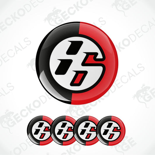 A glossy circular decal or sticker design featuring a stylized black, white, and red 'S' logo, shown with one large version and four smaller versions along the bottom on a light gray background with faint watermark text.