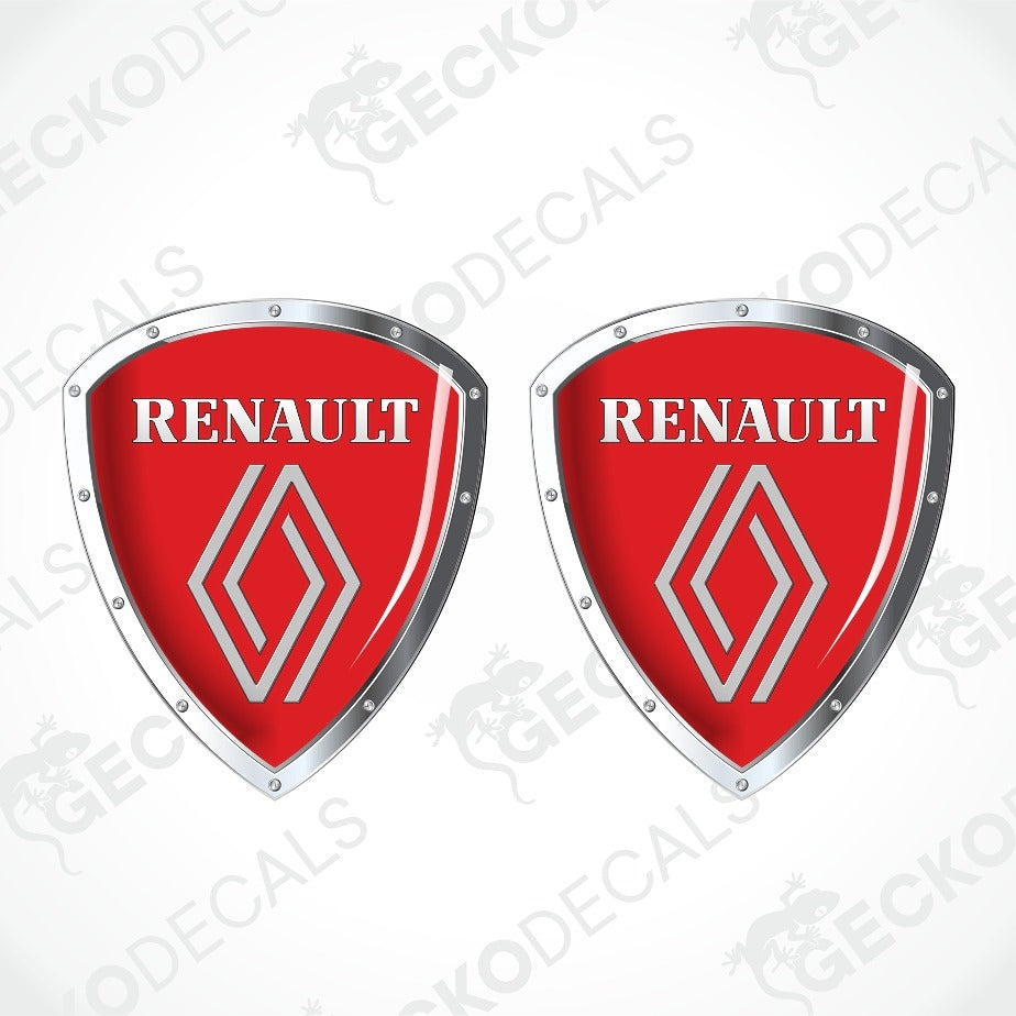 Two identical red shield-shaped Renault decals with silver metallic borders and the white Renault logo and wordmark, shown on a light gray background with faint watermark text.