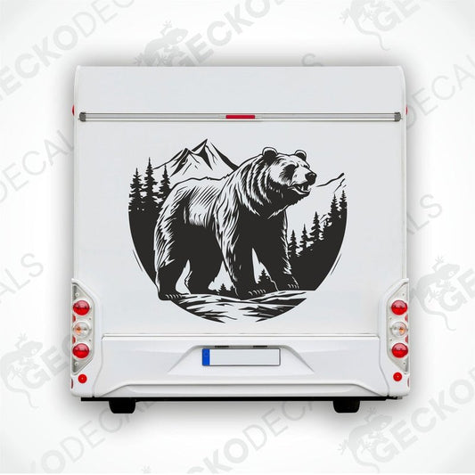 A decal featuring a black bear in a mountainous landscape with a white background, delivered on transfer paper.