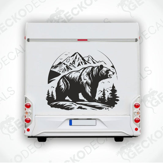 A decal featuring a black bear in a mountainous landscape with a white background, delivered on transfer paper.