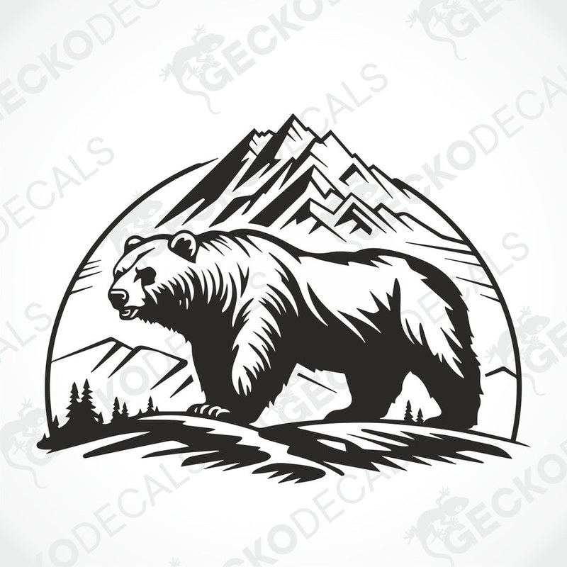 A black decal of a bear in front of mountains on a white surface.