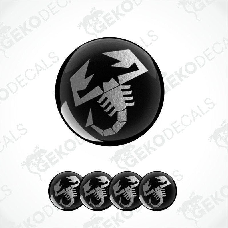 Black and silver decal with a scorpion design on a white background