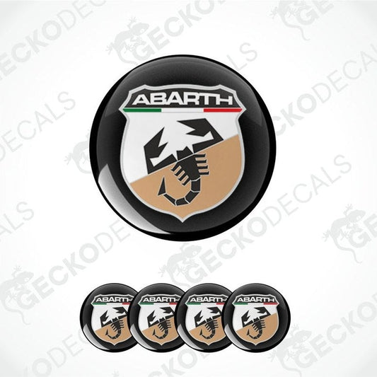 Abarth logo on a round decal with additional decals below on a white background.
