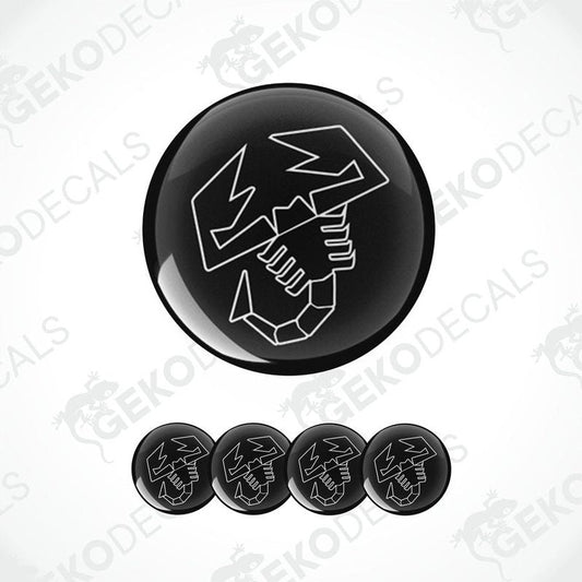 A set of four black and white vinyl decals with a polyurethane coating, featuring a car logo, displayed on a white background.