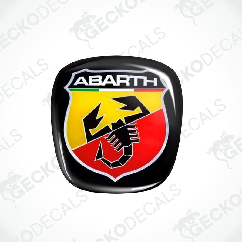 Black, red, yellow, and green vinyl stickers with the 'ABARTH' logo on them.