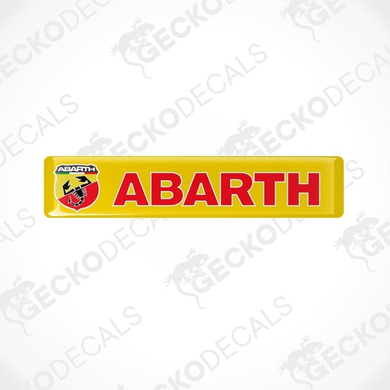 Yellow vinyl stickers with the word 'ABARTH' written in red and green, positioned against a white background with the GeckoDecals logo.