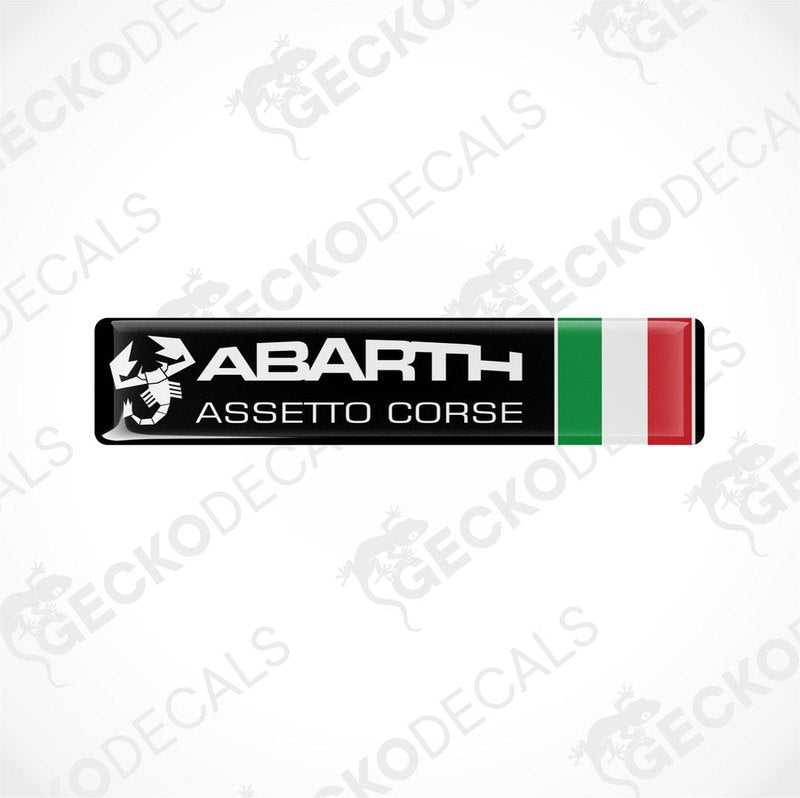 Vinyl decals with a polyurethane coating featuring the Abarth Assetto Corse logo and the Italian flag.