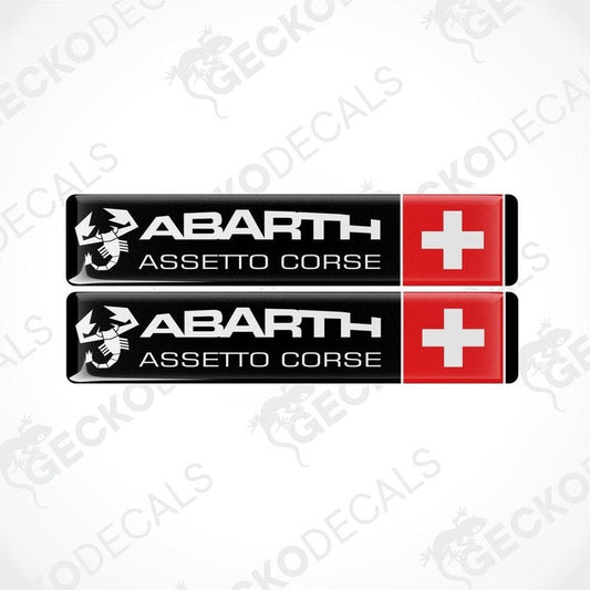 Two vinyl decals with a polyurethane coating featuring the Abarth Assetto Corse branding and the Swiss flag.