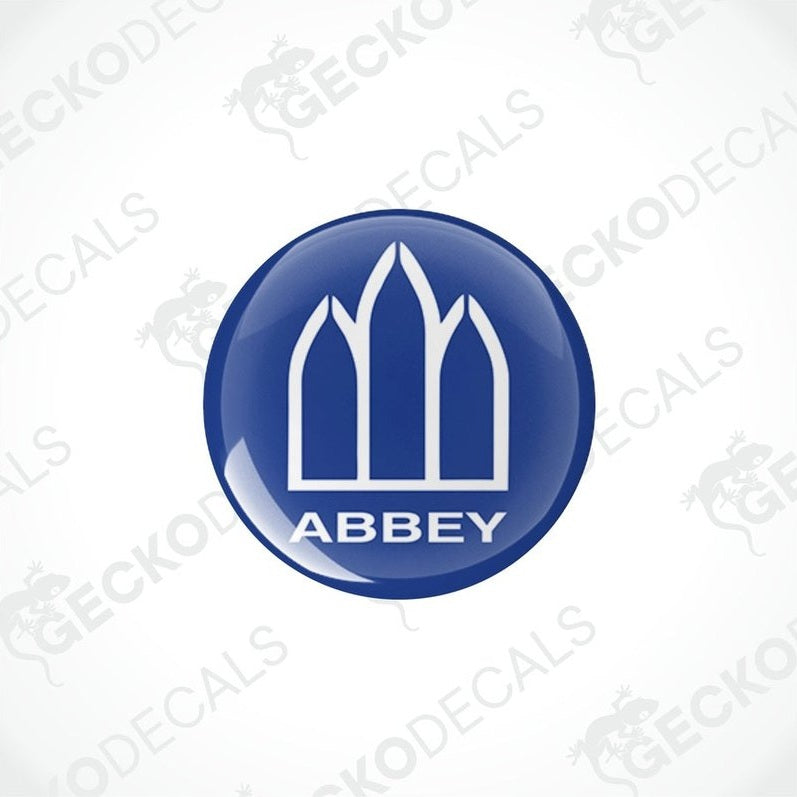 Single Abbey Caravan domed vinyl decal with white graphic on blue background
