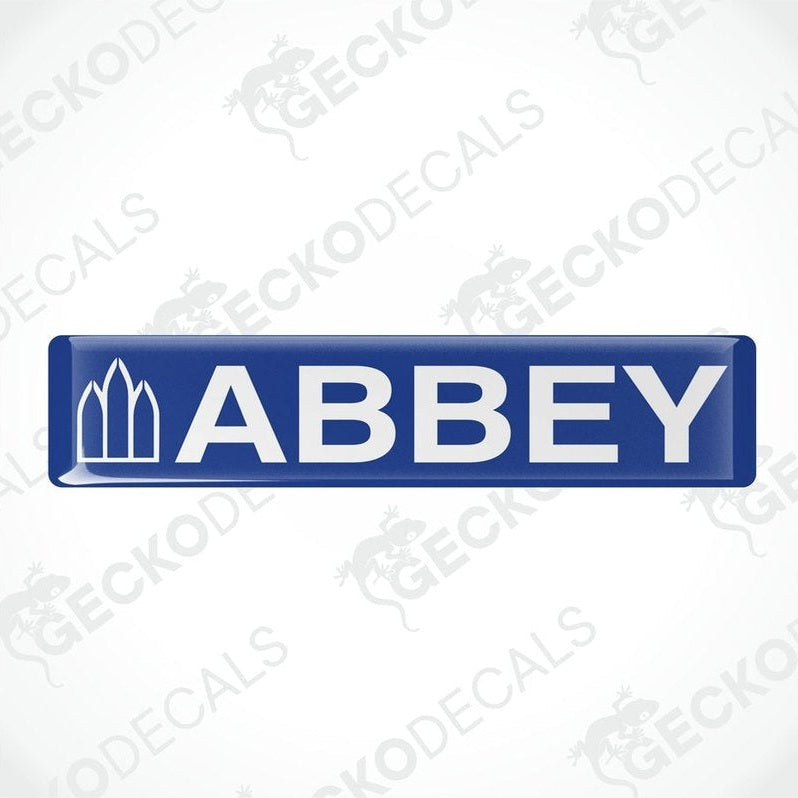 Single blue ABBEY domed epoxy decal with white spire icon