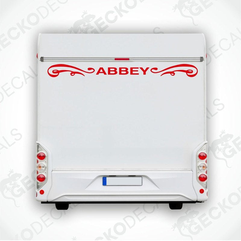 Red Abbey caravan rear decal with ornamental scrollwork applied to white trailer