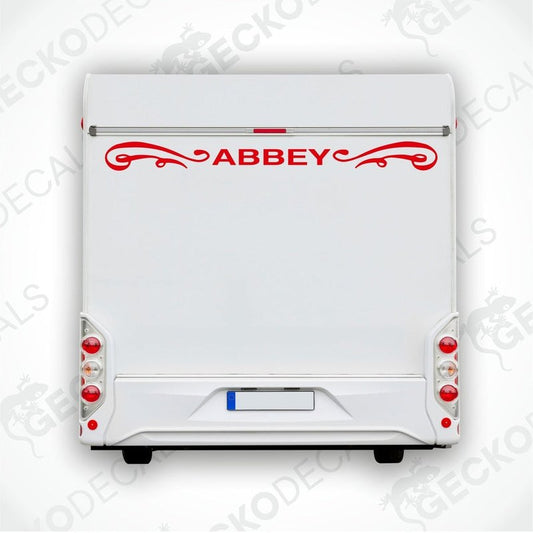 Red Abbey caravan rear decal with ornamental scrollwork applied to white trailer