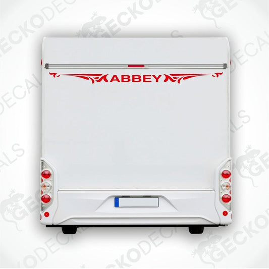 Red Abbey caravan rear decal with ornamental flourishes applied to white trailer